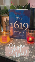 Load and play video in Gallery viewer, The 1619 Project: A New Origin Story (Hardcover)
